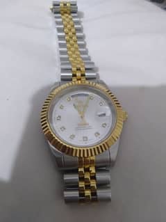 swistar golden and silver dial wrist watch