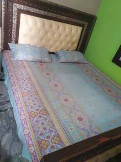 kind wooden bed without matris