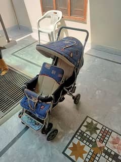 Baby stroller pram 2 seater and sleeping baby