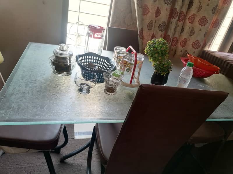 Six seater Dinning table with 6 chairs new condition 4