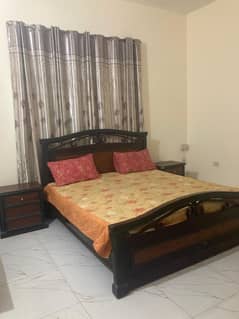 Double Bed With Side Tables , Dressing Table and a Spring Mattress