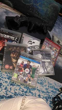 ps3 slim 120gb with 2 wireless controller and 5 games