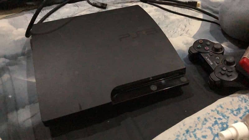 ps3 slim 150gb with 2 wireless controller and all games 3