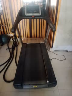 Techno gym treadmill.