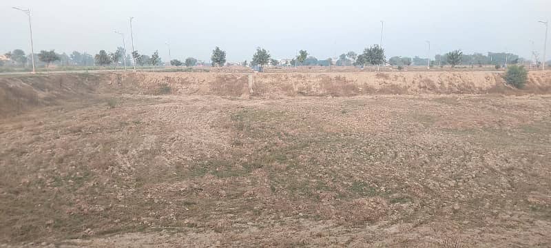 5 MARLA RESIDENTAL PLOT LOWEST PRICE AVAILABLE IN NEW LAHORE CITY NEAR BAHRIA TOWN 1