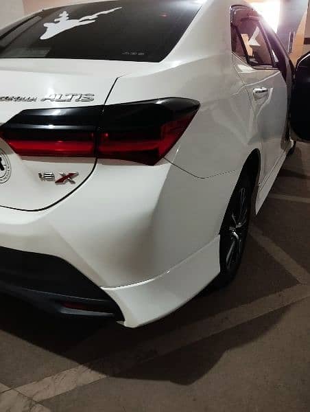 Toyota Corolla Altis Grande Model 2021 White Low Mileage 10
