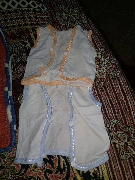 new born baby dresses caps  etc for sell. . used just for one month 9