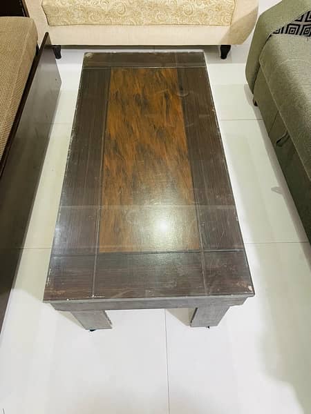wooden table with glass on top 1