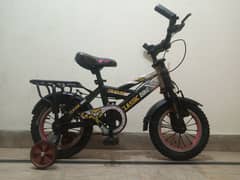 12 INCH IMPORTED CYCLE FOR 2 TO 7 YEAR KIDS 1 MONTH USED 03265153155