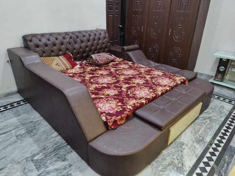 Modern king sized bed along with spring mattress 0