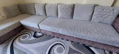 L shaped grey sofa
