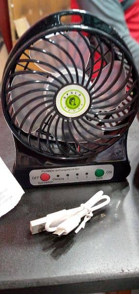 Mini rechargeable Fan with USB charging Cable. 2