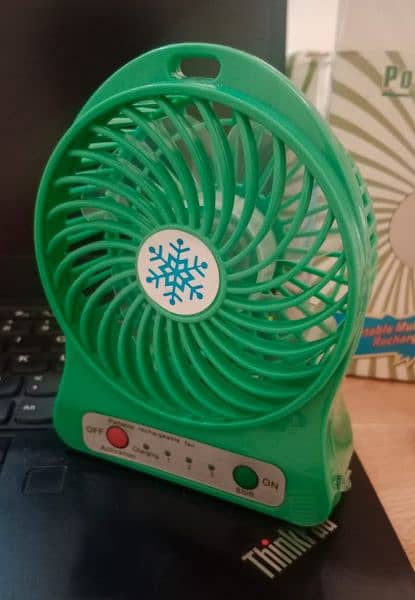 Mini rechargeable Fan with USB charging Cable. 3