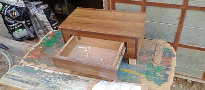 Sewing machine table with drawer