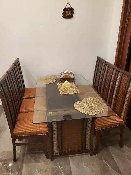 dining table with 6 chairs is available for sale 2