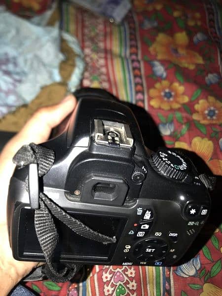 camera model 1100d  lens 55 200 ha 5