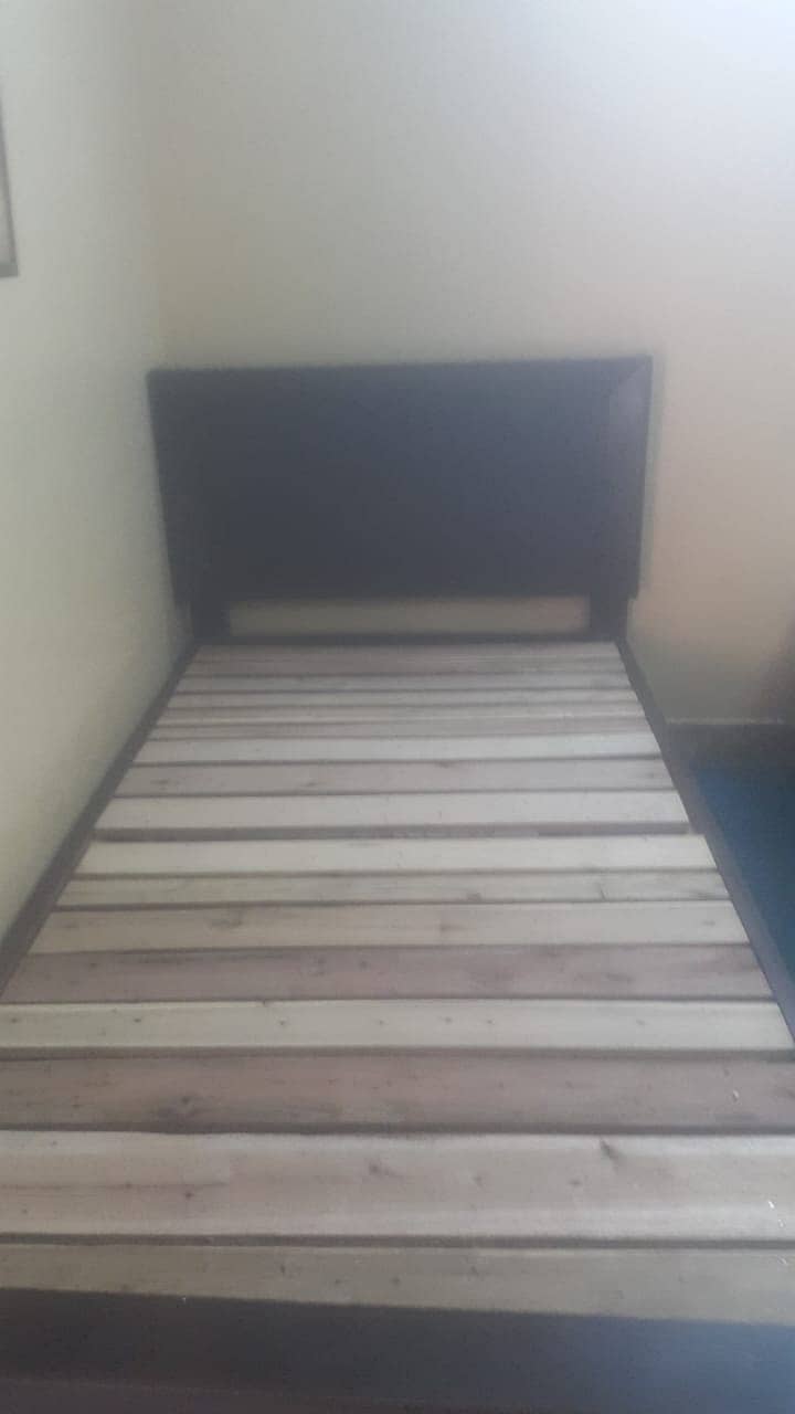 Two single wooden beds with matress. 2