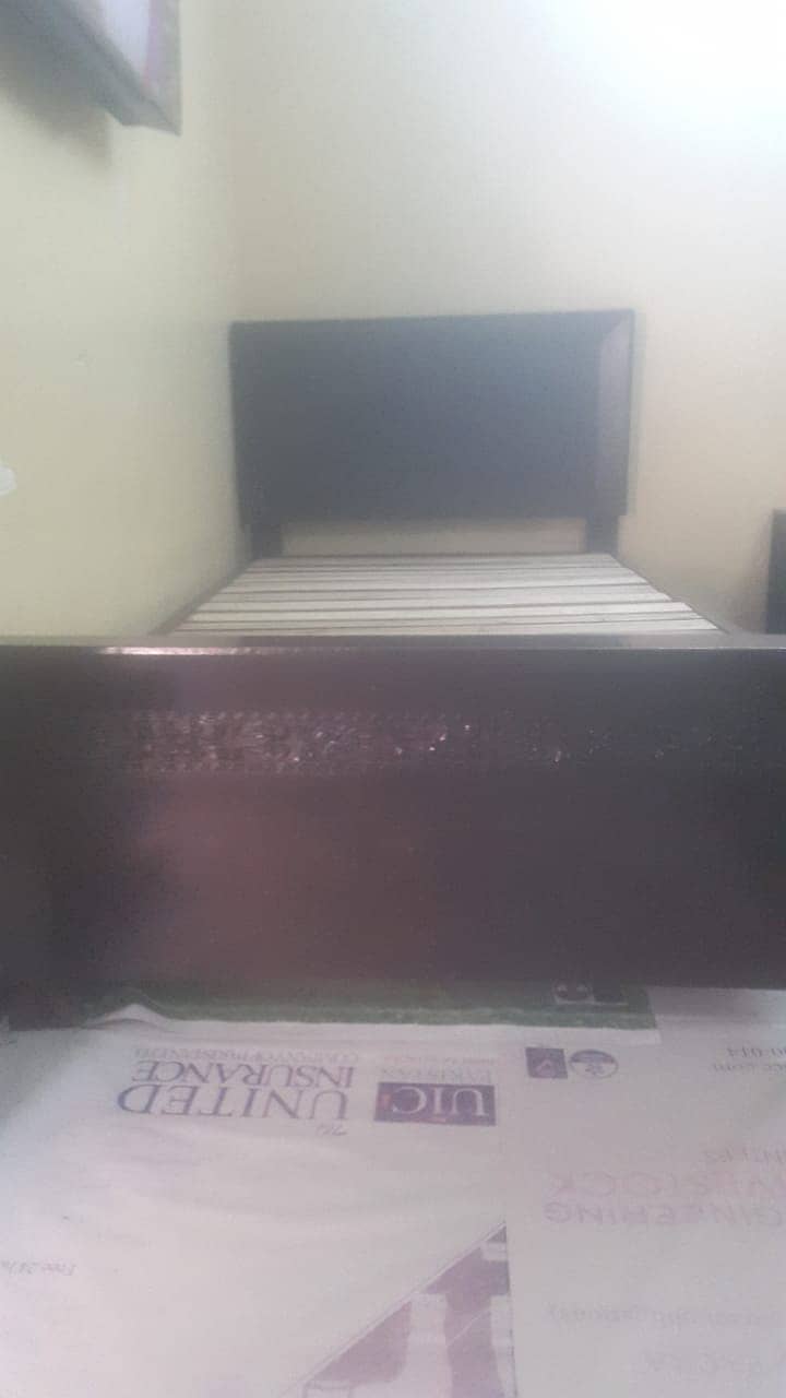 Two single wooden beds with matress. 5