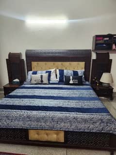 king size bed with side tables and dresser