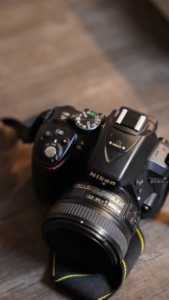 Nikon Camera and  PODMIC (read add) 2