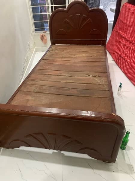 single wooden bed 1
