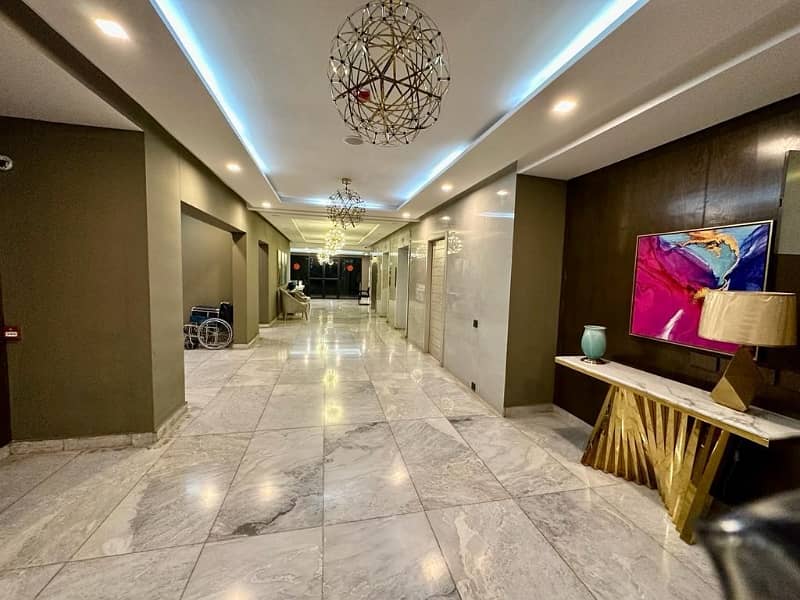 brand new luxery leatest vip furnished 1 bed living appartement available for sale in shahkam Chowk near bahria town road near DHA EME Lahore by fast property services real estate and builders lahore with original pics vip furnished Unfurnished 1