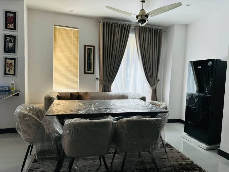 brand new luxery leatest vip furnished 1 bed living appartement available for sale in shahkam Chowk near bahria town road near DHA EME Lahore by fast property services real estate and builders lahore with original pics vip furnished Unfurnished 18