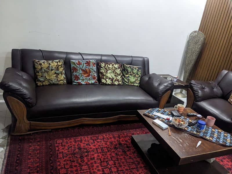five seater sofa with Leather Right and 1 table condition 10/ 9 1
