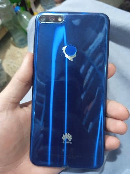 Huawei y7 2018 mobile Hai box bhi sath Hai condition OK Hai 1