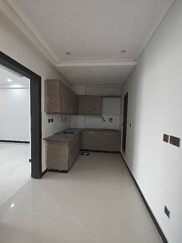Madina Tower E-11 near to F -11 marghla road 2 bed brand new building 14