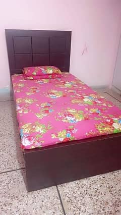 used wooden single bed with mettress in good condition