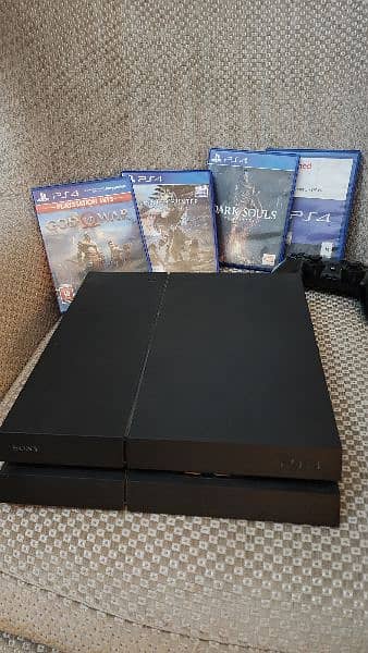 ps4 fat for urgent sale with 5 games and a controller 1