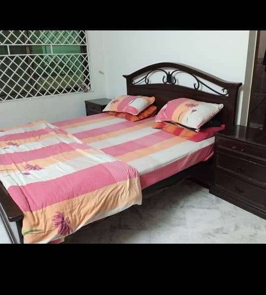 wooden bed with side tables 1