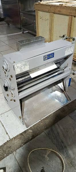 pizza oven south star, dough mixer, prep table, delivery bags, fryer 3
