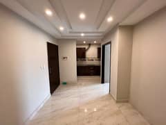 1 bed apartment non furnished available for rent gulmohar block Bahria town Lahor