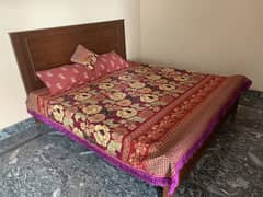 Double Bed including mattress.