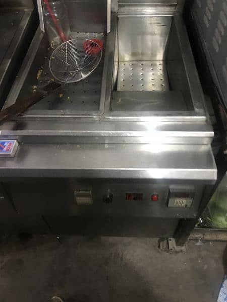 Fast food counter and oven with pan etc. 1