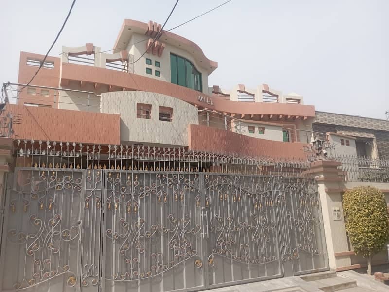 Prominently-Located 1 Kanal House Available In PIA Housing Scheme Block A1 0