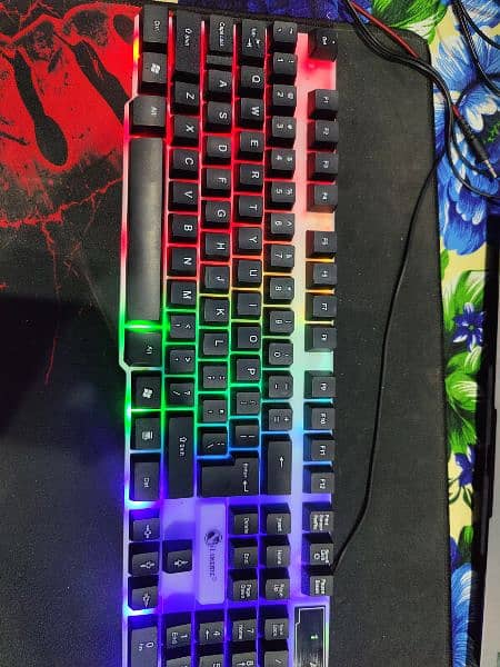Gaming Semi Mechanical keyboard with RGB lights. Mechanical feel. 1