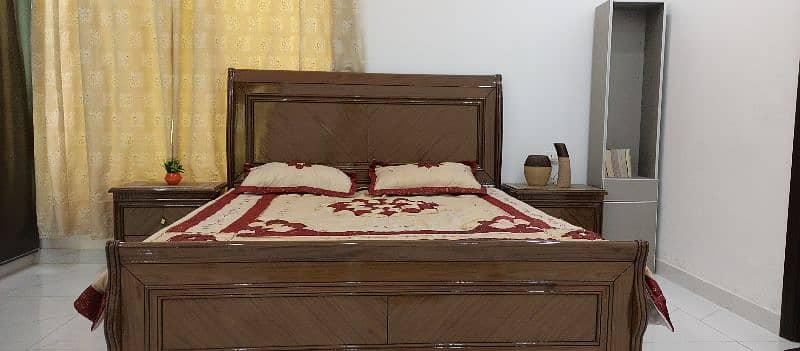 Bed of walnut wood with gloss polish 13