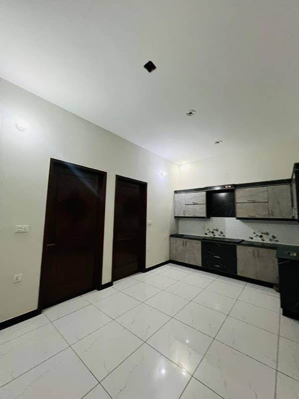 OUT STANDING FLAT FOR SALE SAADI TOWN BLOCK 1 WEST OPEN 60 FIT ROAD BACK 40 FIT ROAD NEAR PARK 16