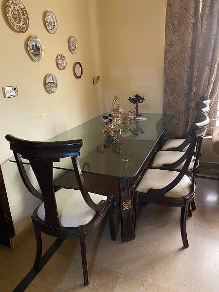 Glass top dining table with 8 chairs 0