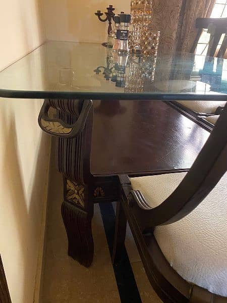 Glass top dining table with 8 chairs 3
