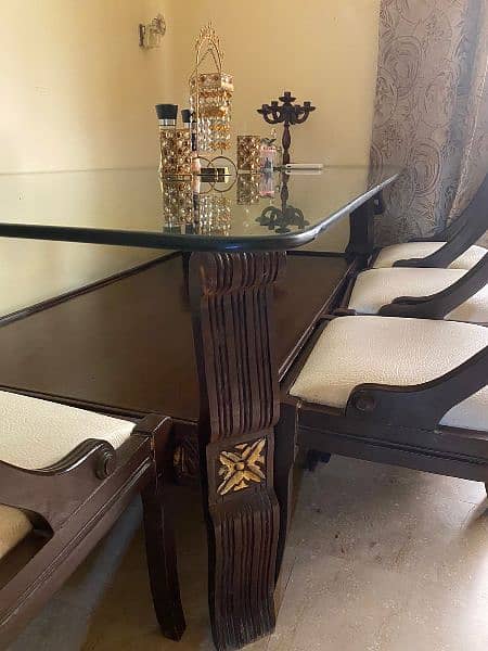 Glass top dining table with 8 chairs 4