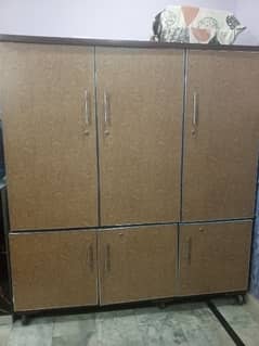 3 doors Wooden wardrobe with 3 large boxes brand new .