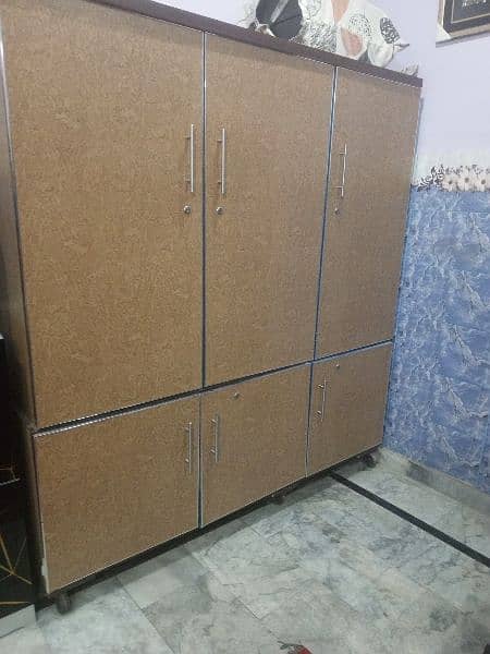 3 doors Wooden wardrobe with 3 large boxes brand new . 4