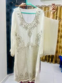 its a shafoon suit embellished with stones sequins and dimondtees .