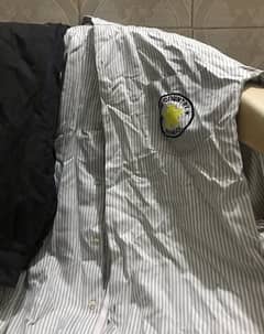 i am selling 2  uniforms of (the country school )