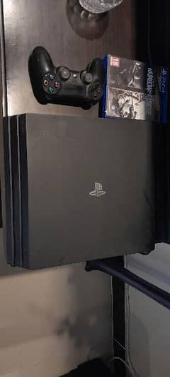 PS4 PRO 1TB WITH GAMES AND CONTROLLERS