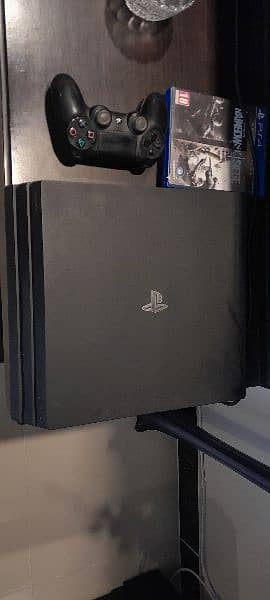 PS4 PRO 1TB WITH GAMES AND CONTROLLERS 0